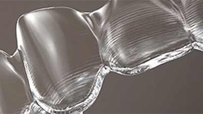 A close-up picture of Invisalign clear braces